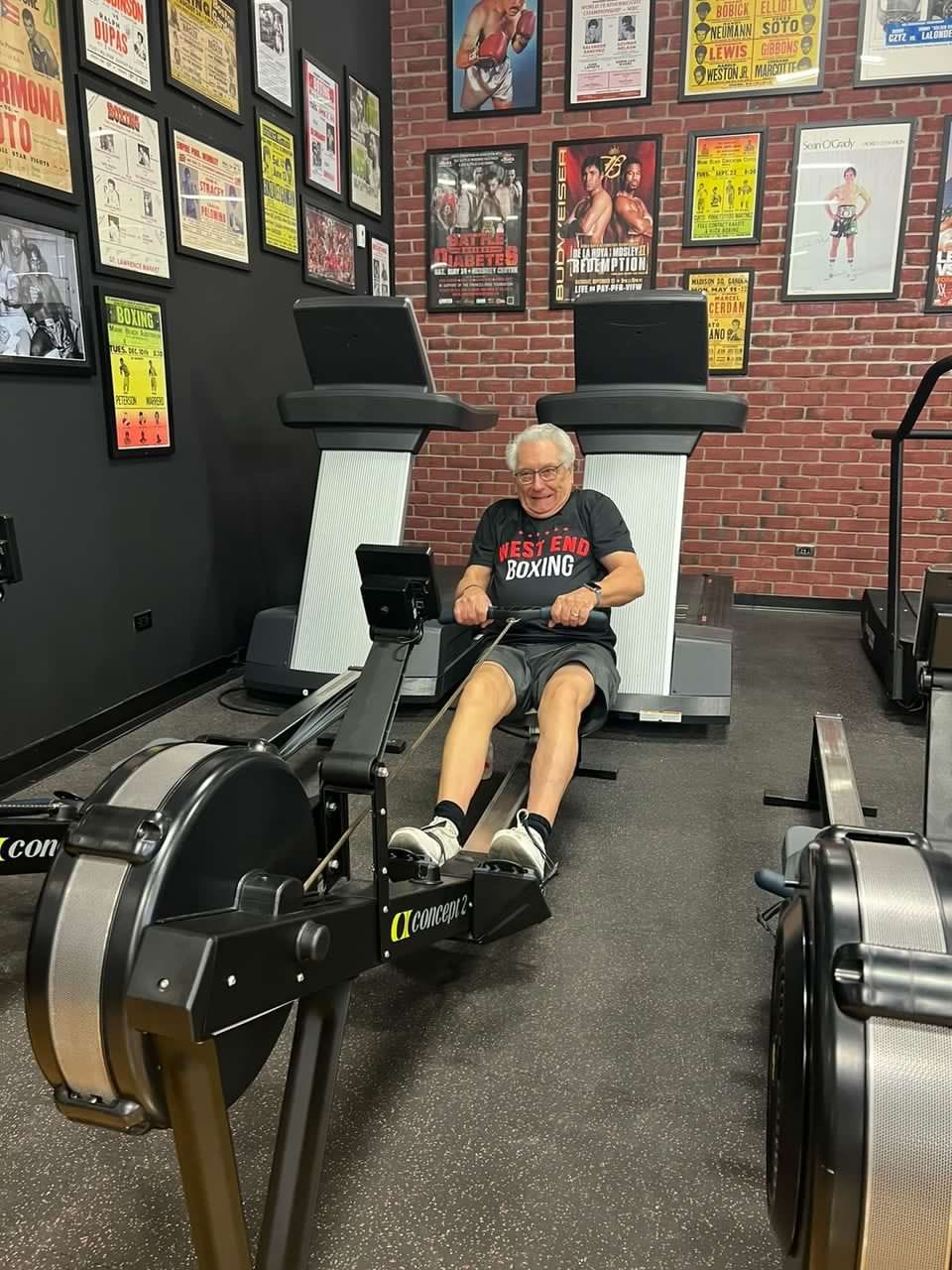 Akos doing his warm-up on a rowing machine at West End Athletic Club