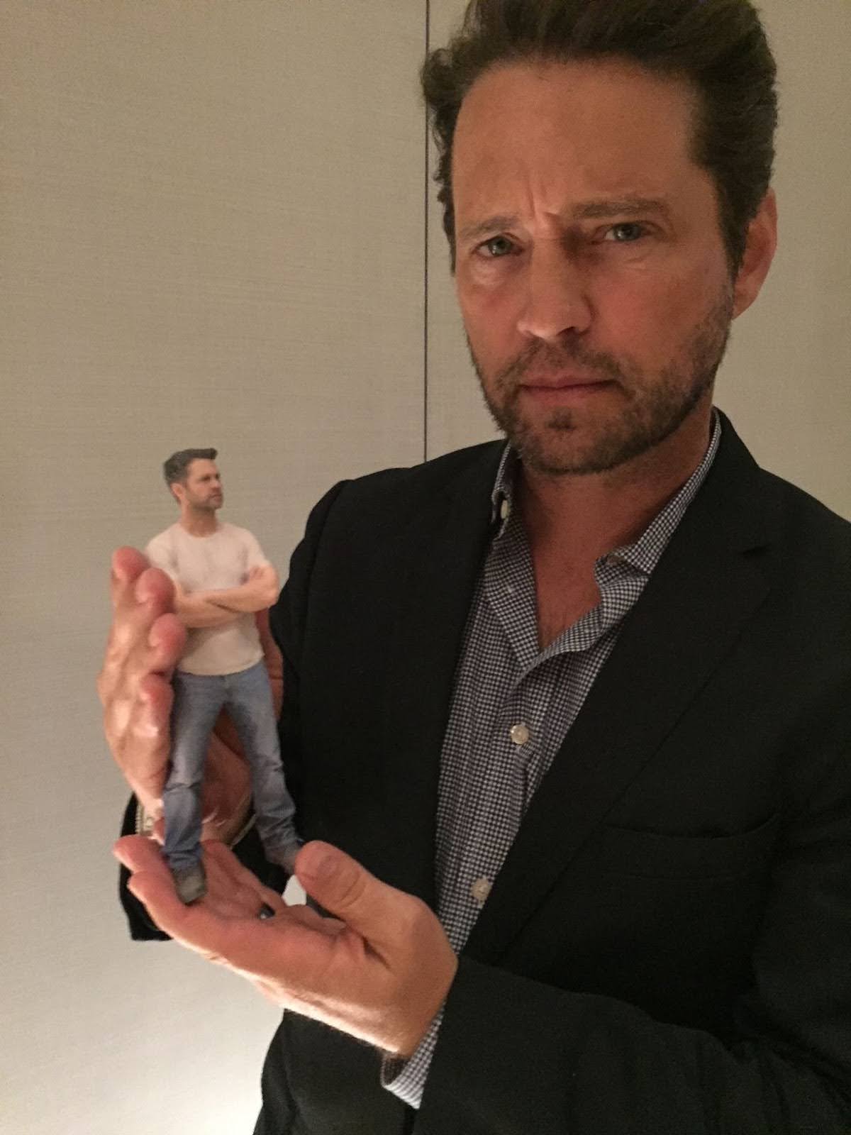 Actor Jason Priestley holding his 3D print.