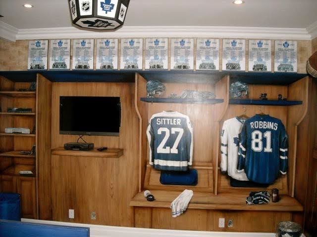 A Toronto Maple Leafs-themed room in a brand-new house. Everything in the room is hand-painted and flat except for the shelf and TV.